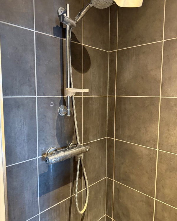 Shower wall and fittings – before