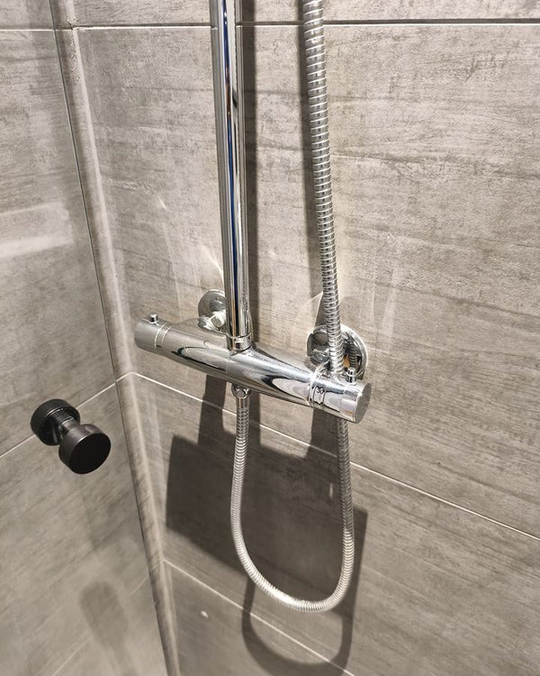 Limescale on shower and thermostat – after